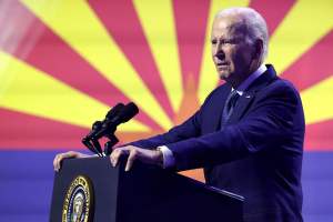 President Joe Biden at Tempe Center for the Arts on Thursday, where he honored the late Sen. John McCain and advocated for the defense of American democracy by bashing former President Donald Trump. (Photo by Kevinjonah Paguio/Cronkite News)